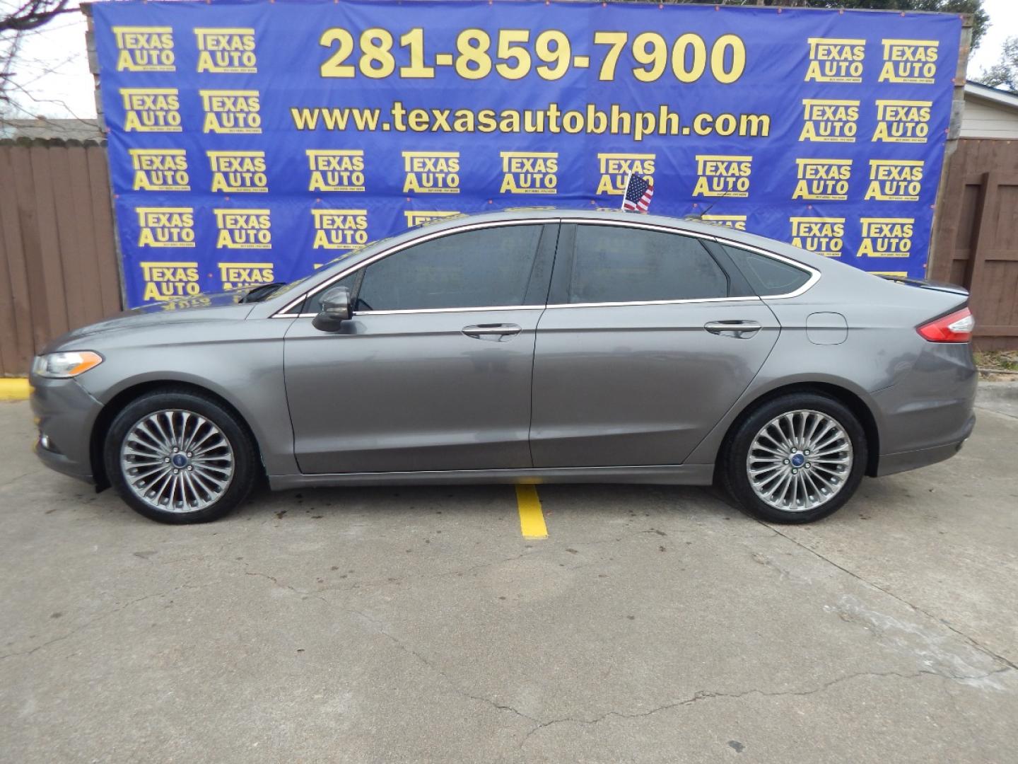 2014 GRAY Ford Fusion Titanium (3FA6P0K99ER) with an 2.0L L4 DOHC 16V engine, located at 16710 Clay Rd., Houston, TX, 77084, (281) 859-7900, 0.000000, 0.000000 - Low Donw. Low Payments. - Photo#0