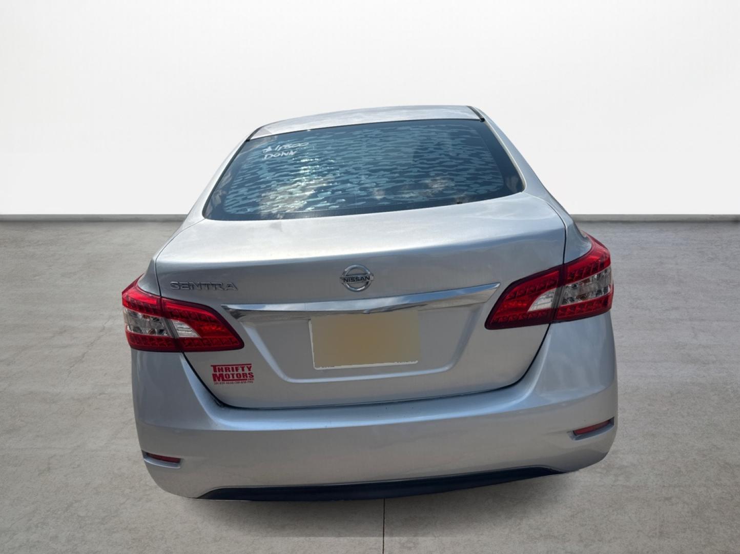 2015 Nissan Sentra S 6MT (3N1AB7AP2FY) with an 1.8L L4 SFI DOHC 16V engine, 6-Speed Manual transmission, located at 16710 Clay Rd., Houston, TX, 77084, (281) 859-7900, 0.000000, 0.000000 - Photo#5