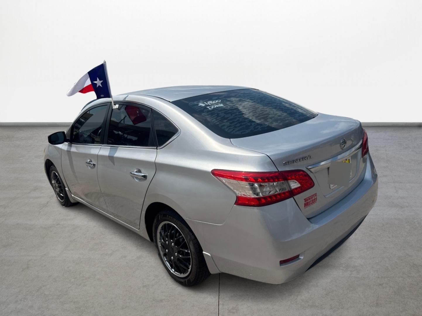 2015 Nissan Sentra S 6MT (3N1AB7AP2FY) with an 1.8L L4 SFI DOHC 16V engine, 6-Speed Manual transmission, located at 16710 Clay Rd., Houston, TX, 77084, (281) 859-7900, 0.000000, 0.000000 - Photo#6