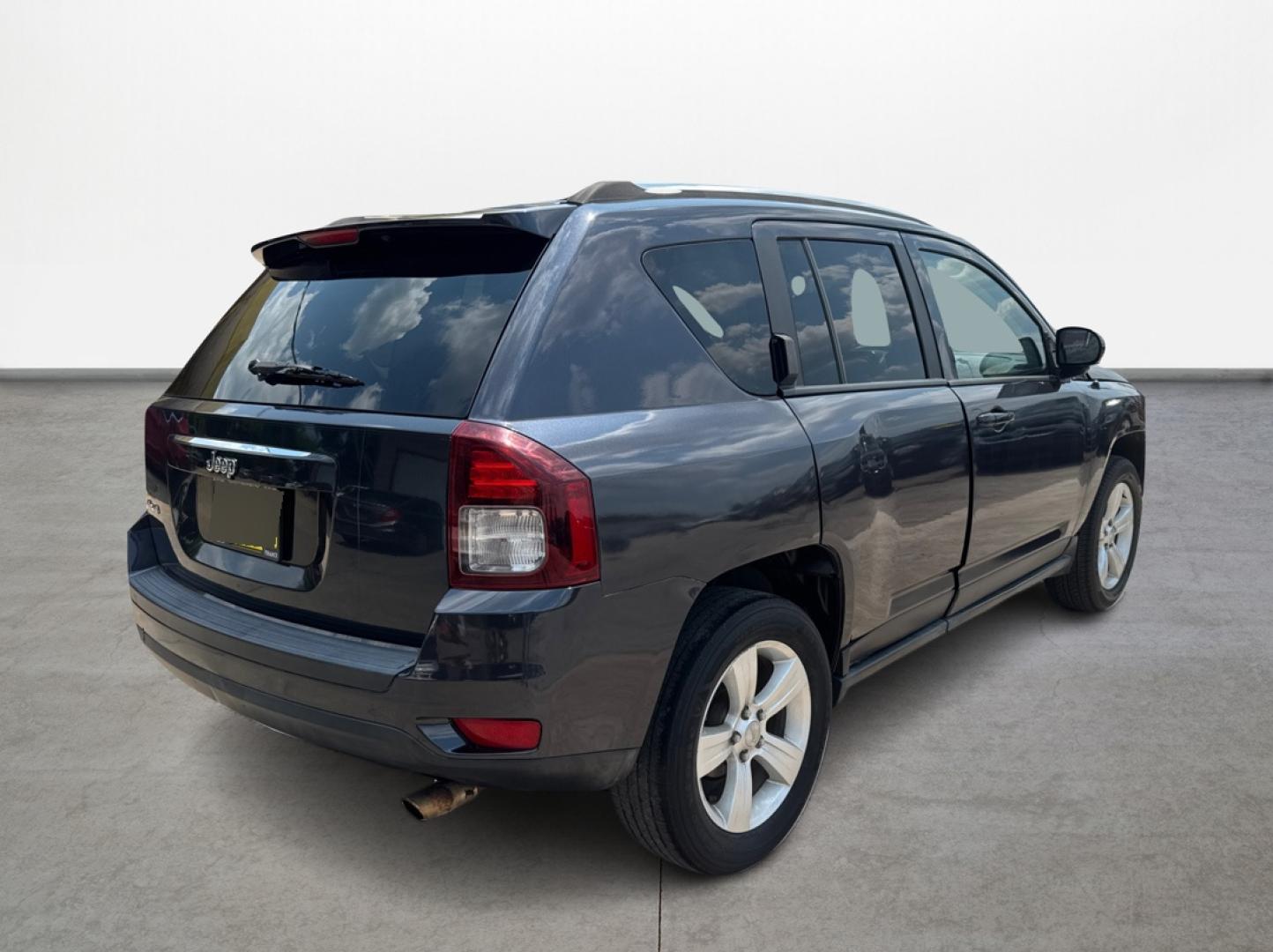 2014 Jeep Compass Sport 4WD (1C4NJDBBXED) with an 2.4L L4 DOHC 16V engine, located at 16710 Clay Rd., Houston, TX, 77084, (281) 859-7900, 0.000000, 0.000000 - Photo#4