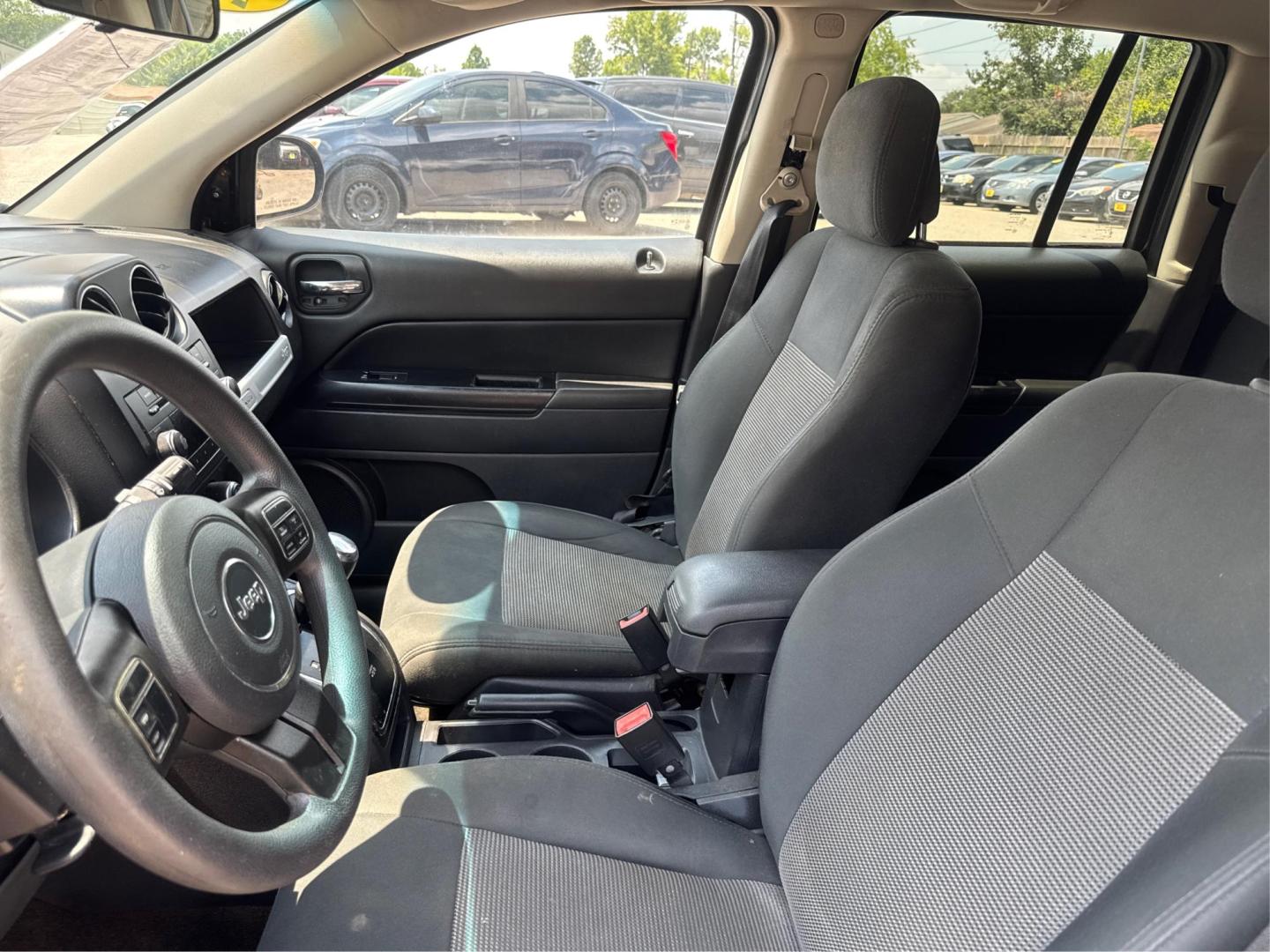 2014 Jeep Compass Sport 4WD (1C4NJDBBXED) with an 2.4L L4 DOHC 16V engine, located at 16710 Clay Rd., Houston, TX, 77084, (281) 859-7900, 0.000000, 0.000000 - Photo#8