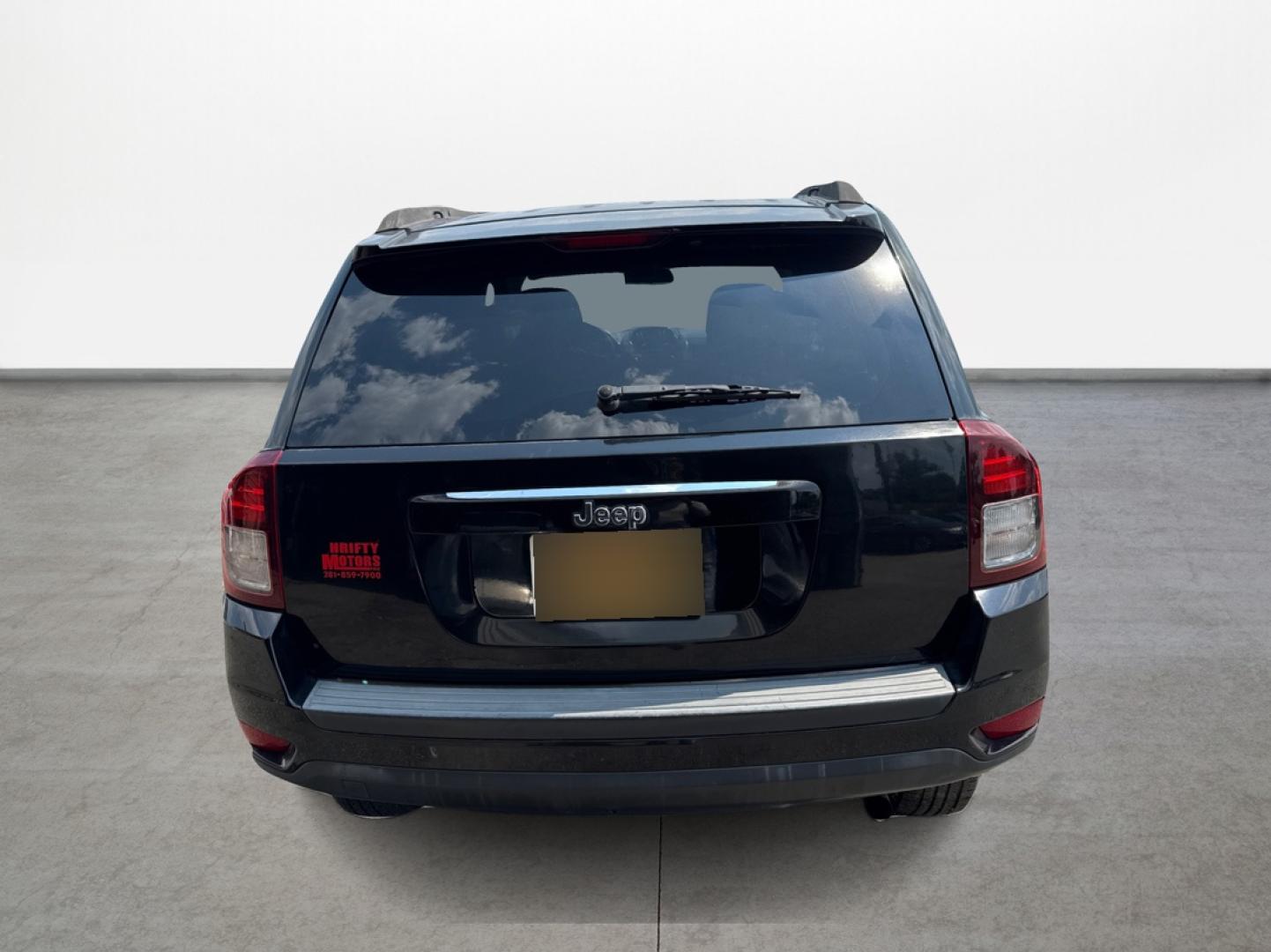 2014 Jeep Compass Sport FWD (1C4NJCBA6ED) with an 2.0L L4 DOHC 16V engine, located at 16710 Clay Rd., Houston, TX, 77084, (281) 859-7900, 0.000000, 0.000000 - Photo#5