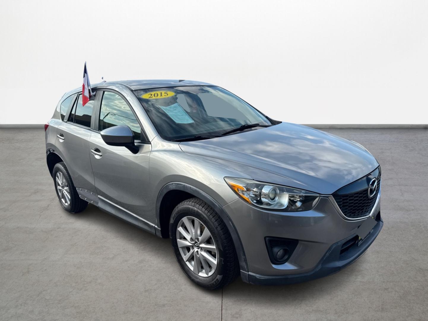 2015 Mazda CX-5 Touring (JM3KE2CY1F0) with an 2.5L L4 DOHC 16V engine, 6-Speed Automatic transmission, located at 16710 Clay Rd., Houston, TX, 77084, (281) 859-7900, 0.000000, 0.000000 - Photo#2