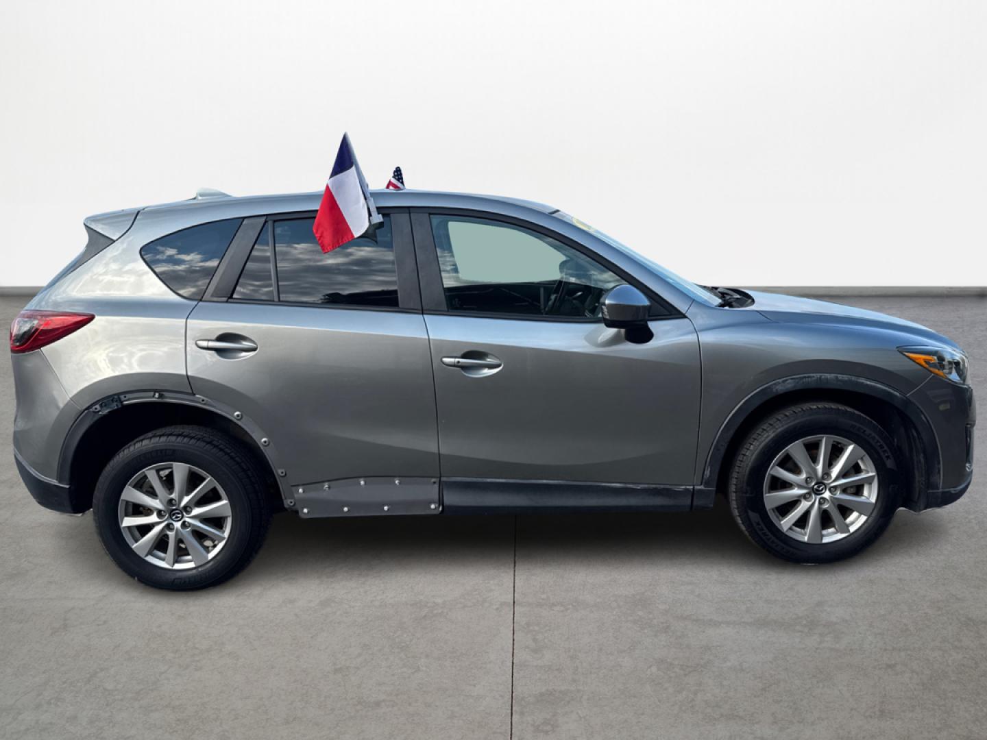 2015 Mazda CX-5 Touring (JM3KE2CY1F0) with an 2.5L L4 DOHC 16V engine, 6-Speed Automatic transmission, located at 16710 Clay Rd., Houston, TX, 77084, (281) 859-7900, 0.000000, 0.000000 - Photo#3
