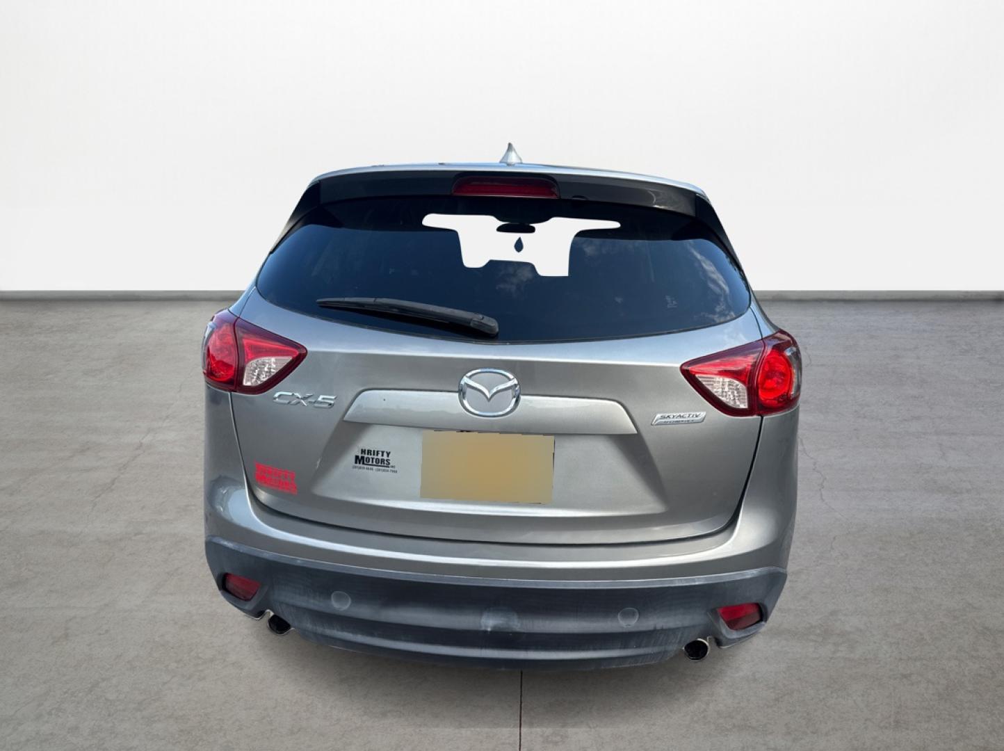 2015 Mazda CX-5 Touring (JM3KE2CY1F0) with an 2.5L L4 DOHC 16V engine, 6-Speed Automatic transmission, located at 16710 Clay Rd., Houston, TX, 77084, (281) 859-7900, 0.000000, 0.000000 - Photo#5