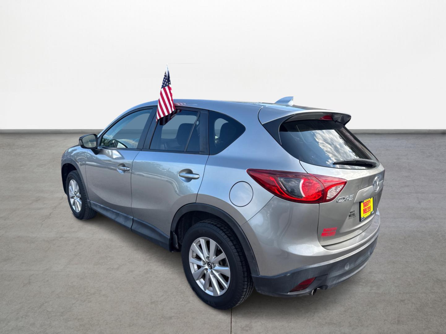 2015 Mazda CX-5 Touring (JM3KE2CY1F0) with an 2.5L L4 DOHC 16V engine, 6-Speed Automatic transmission, located at 16710 Clay Rd., Houston, TX, 77084, (281) 859-7900, 0.000000, 0.000000 - Photo#6