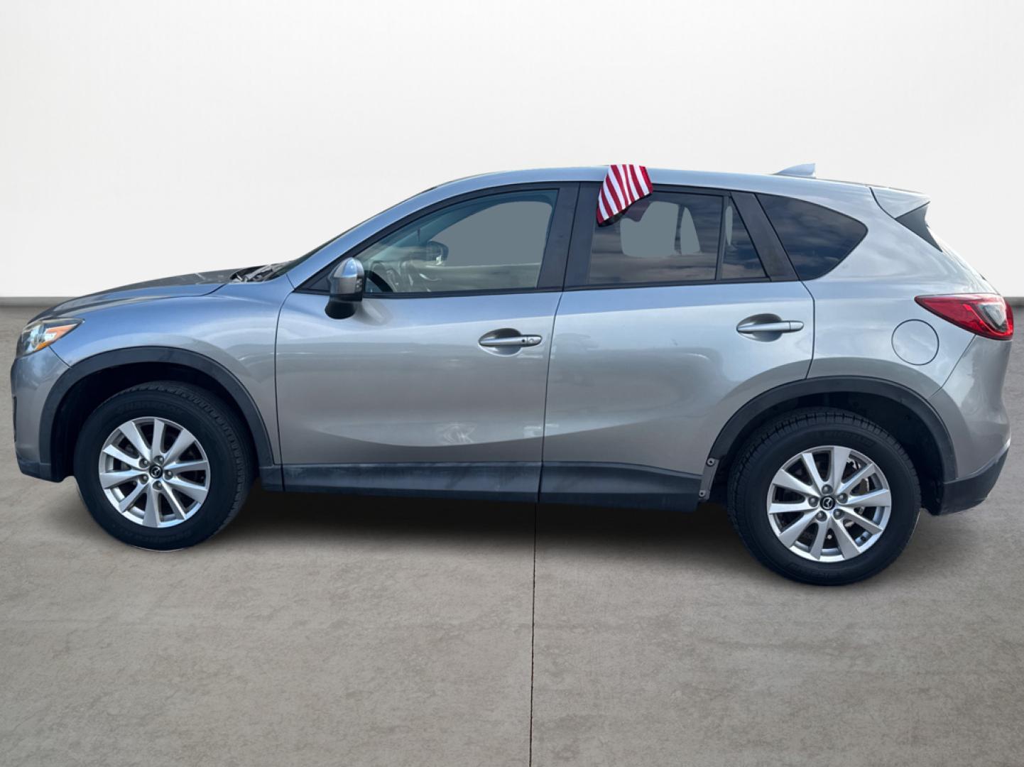 2015 Mazda CX-5 Touring (JM3KE2CY1F0) with an 2.5L L4 DOHC 16V engine, 6-Speed Automatic transmission, located at 16710 Clay Rd., Houston, TX, 77084, (281) 859-7900, 0.000000, 0.000000 - Photo#7