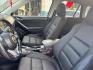 2015 Mazda CX-5 Touring (JM3KE2CY1F0) with an 2.5L L4 DOHC 16V engine, 6-Speed Automatic transmission, located at 16710 Clay Rd., Houston, TX, 77084, (281) 859-7900, 0.000000, 0.000000 - Photo#8