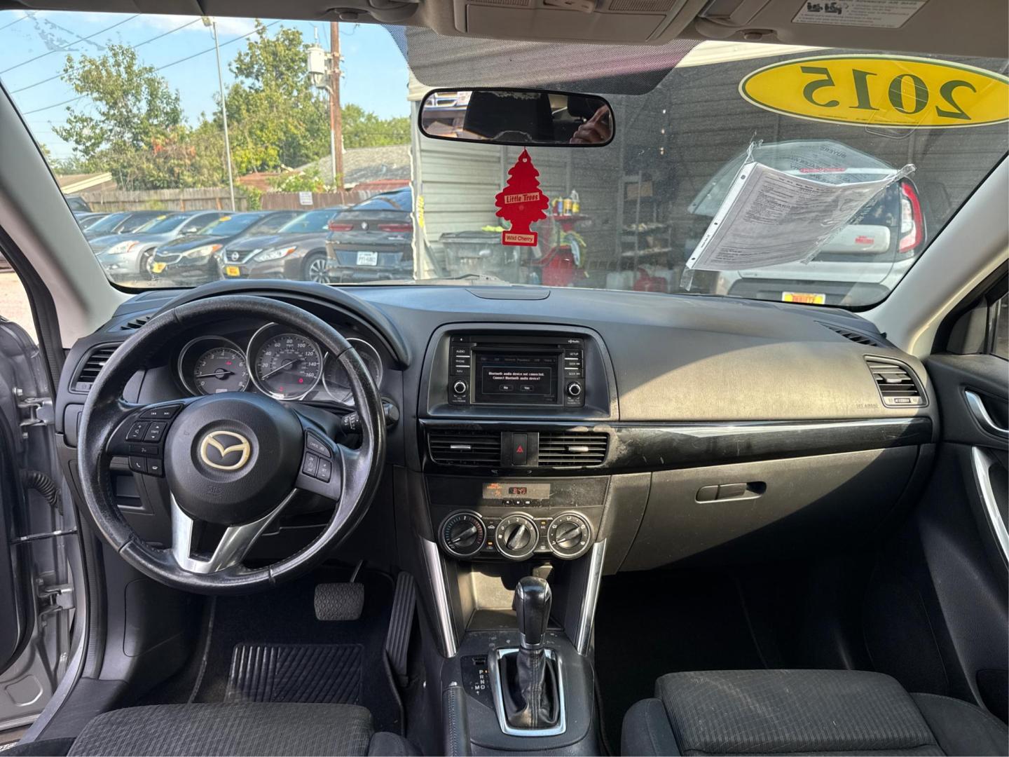 2015 Mazda CX-5 Touring (JM3KE2CY1F0) with an 2.5L L4 DOHC 16V engine, 6-Speed Automatic transmission, located at 16710 Clay Rd., Houston, TX, 77084, (281) 859-7900, 0.000000, 0.000000 - Photo#10