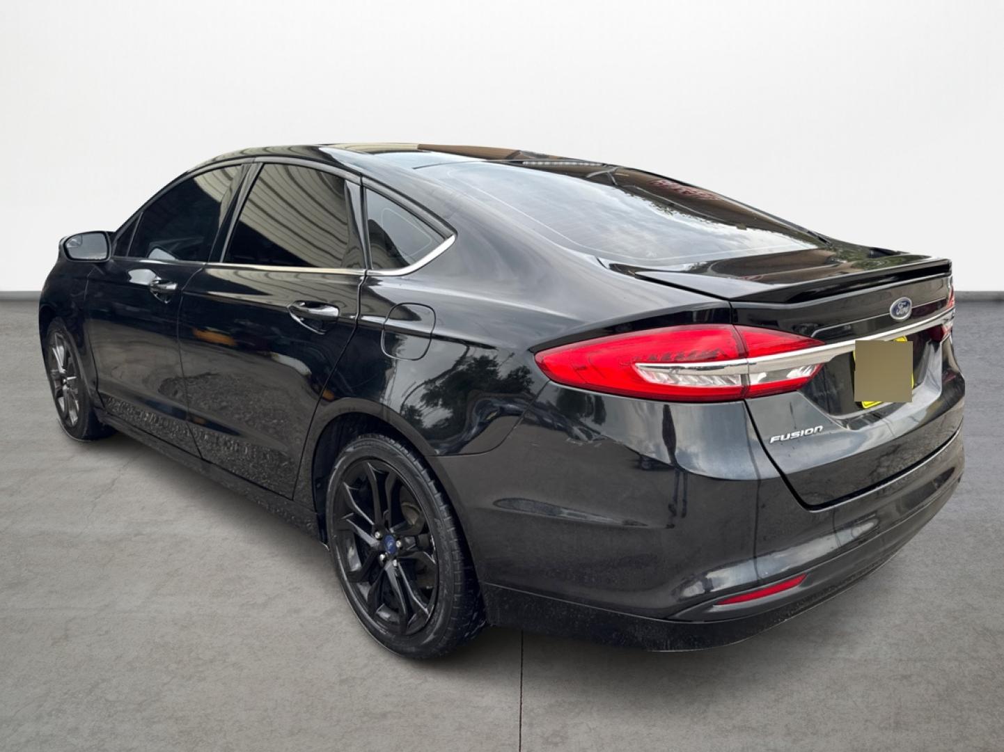 2018 Ford Fusion S (3FA6P0G71JR) with an 2.5L L4 DOHC 16V engine, 6A transmission, located at 16710 Clay Rd., Houston, TX, 77084, (281) 859-7900, 0.000000, 0.000000 - Photo#6