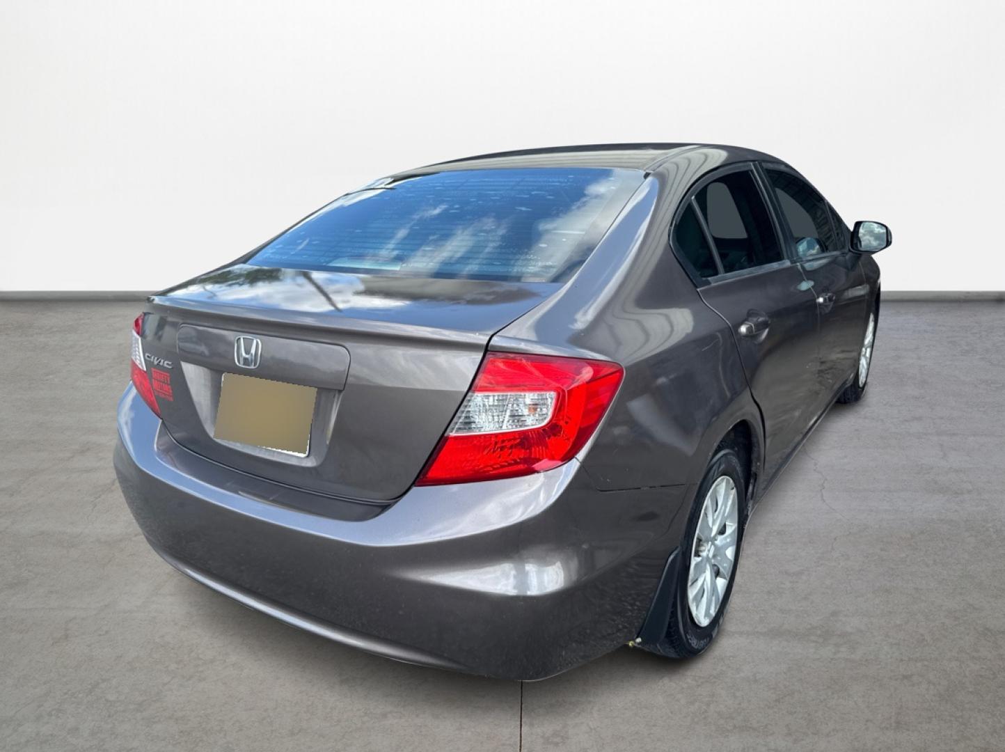 2012 Honda Civic LX Sedan 5-Speed AT (2HGFB2F5XCH) with an 1.8L L4 SOHC 16V engine, 5-Speed Automatic transmission, located at 16710 Clay Rd., Houston, TX, 77084, (281) 859-7900, 0.000000, 0.000000 - Photo#4
