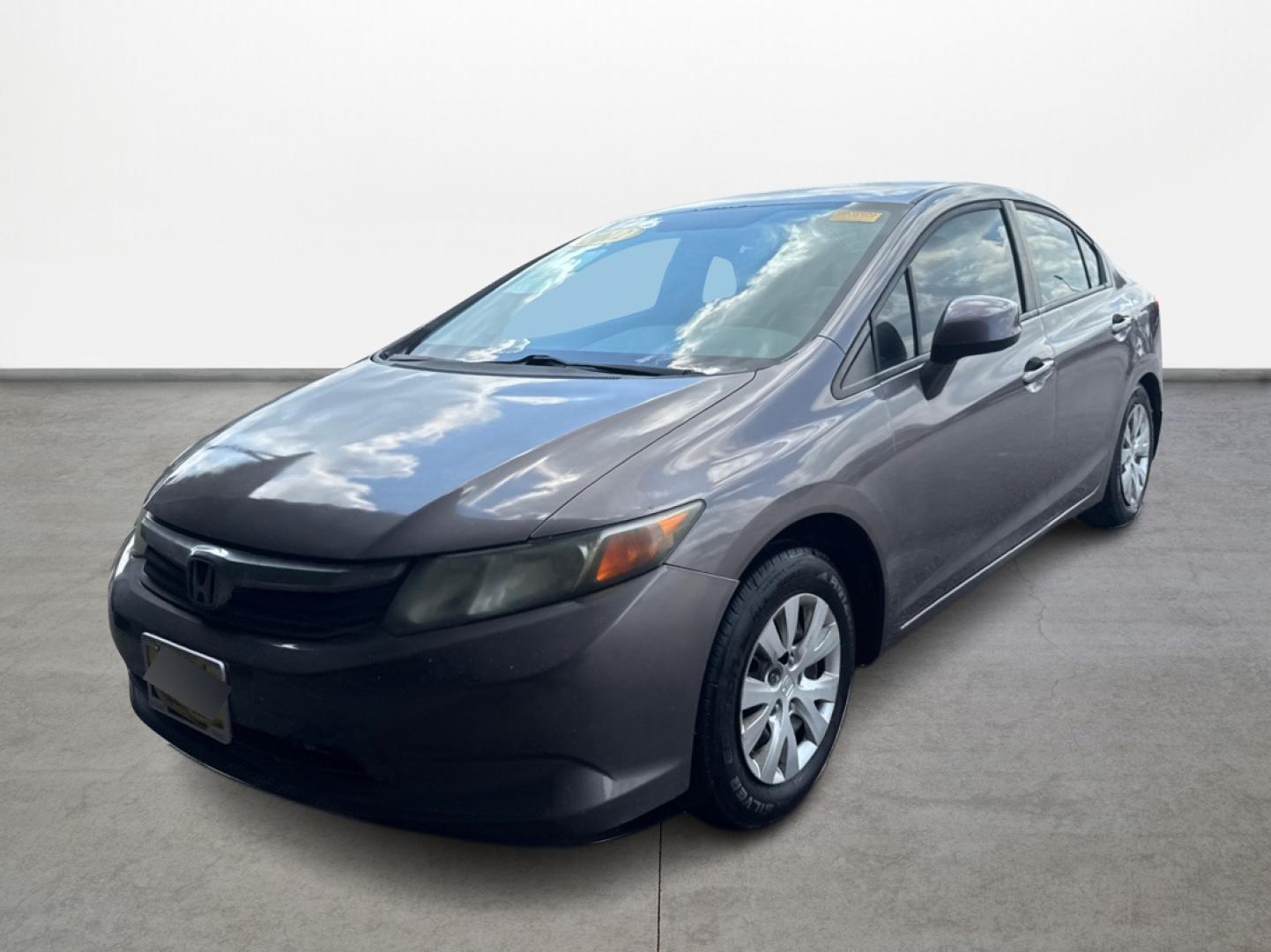 2012 Honda Civic LX Sedan 5-Speed AT (2HGFB2F5XCH) with an 1.8L L4 SOHC 16V engine, 5-Speed Automatic transmission, located at 16710 Clay Rd., Houston, TX, 77084, (281) 859-7900, 0.000000, 0.000000 - Photo#2