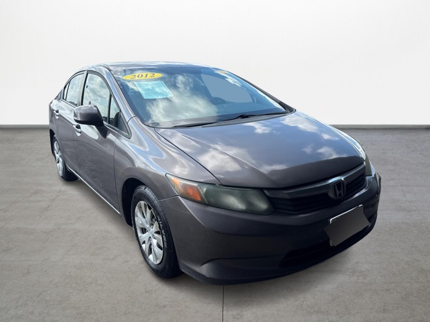 2012 Honda Civic LX Sedan 5-Speed AT (2HGFB2F5XCH) with an 1.8L L4 SOHC 16V engine, 5-Speed Automatic transmission, located at 16710 Clay Rd., Houston, TX, 77084, (281) 859-7900, 0.000000, 0.000000 - Photo#0