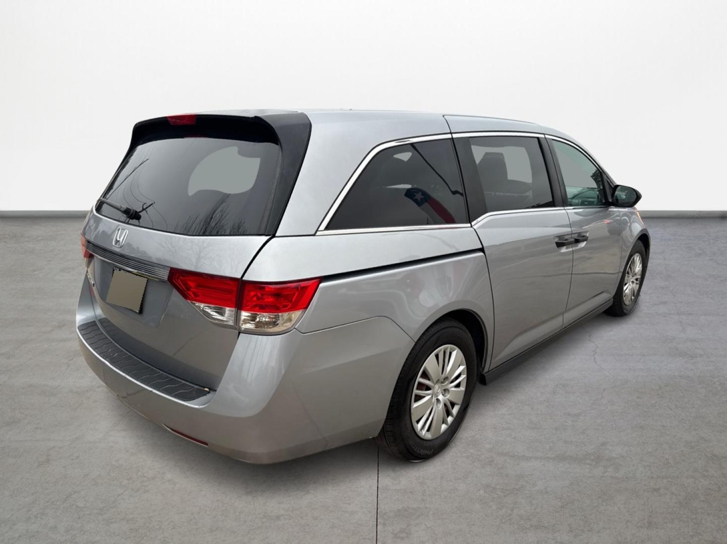 2016 Honda Odyssey LX (5FNRL5H26GB) with an 3.5L V6 SOHC 24V engine, 6A transmission, located at 16710 Clay Rd., Houston, TX, 77084, (281) 859-7900, 0.000000, 0.000000 - Photo#2