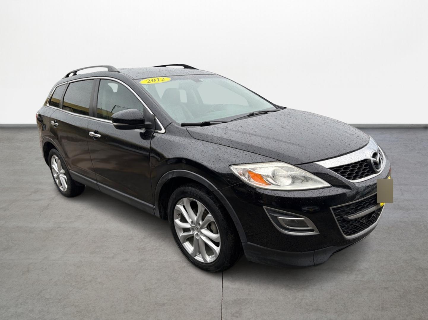 2012 Mazda CX-9 Grand Touring AWD (JM3TB3DV3C0) with an 3.7L V6 DOHC 24V engine, 6-Speed Automatic transmission, located at 16710 Clay Rd., Houston, TX, 77084, (281) 859-7900, 0.000000, 0.000000 - Photo#2