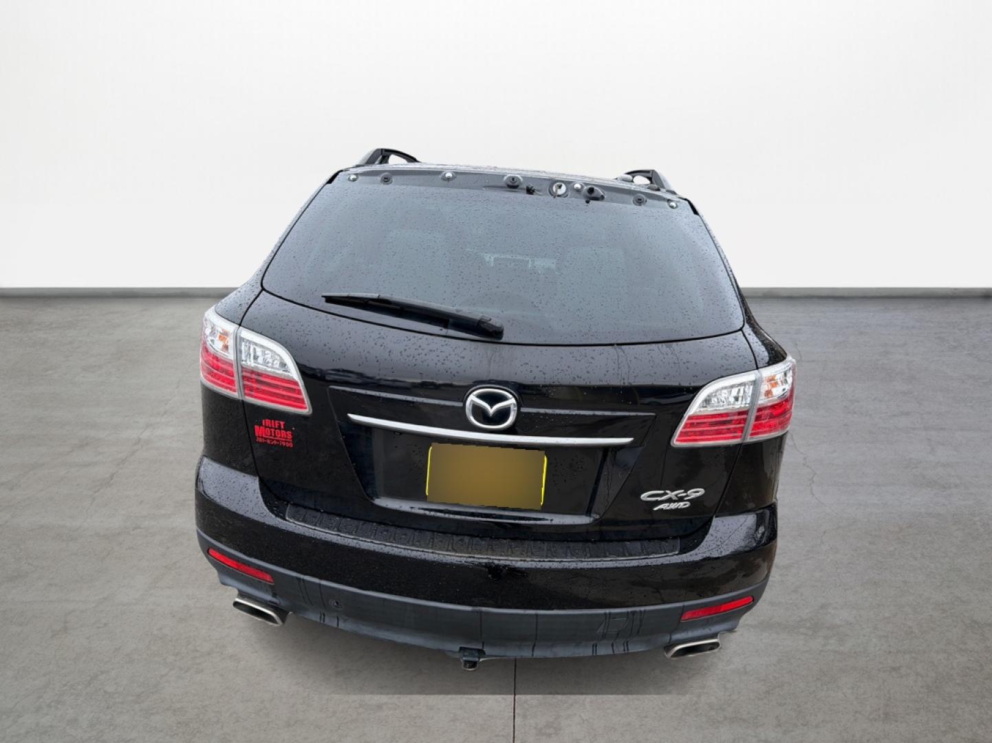 2012 Mazda CX-9 Grand Touring AWD (JM3TB3DV3C0) with an 3.7L V6 DOHC 24V engine, 6-Speed Automatic transmission, located at 16710 Clay Rd., Houston, TX, 77084, (281) 859-7900, 0.000000, 0.000000 - Photo#5