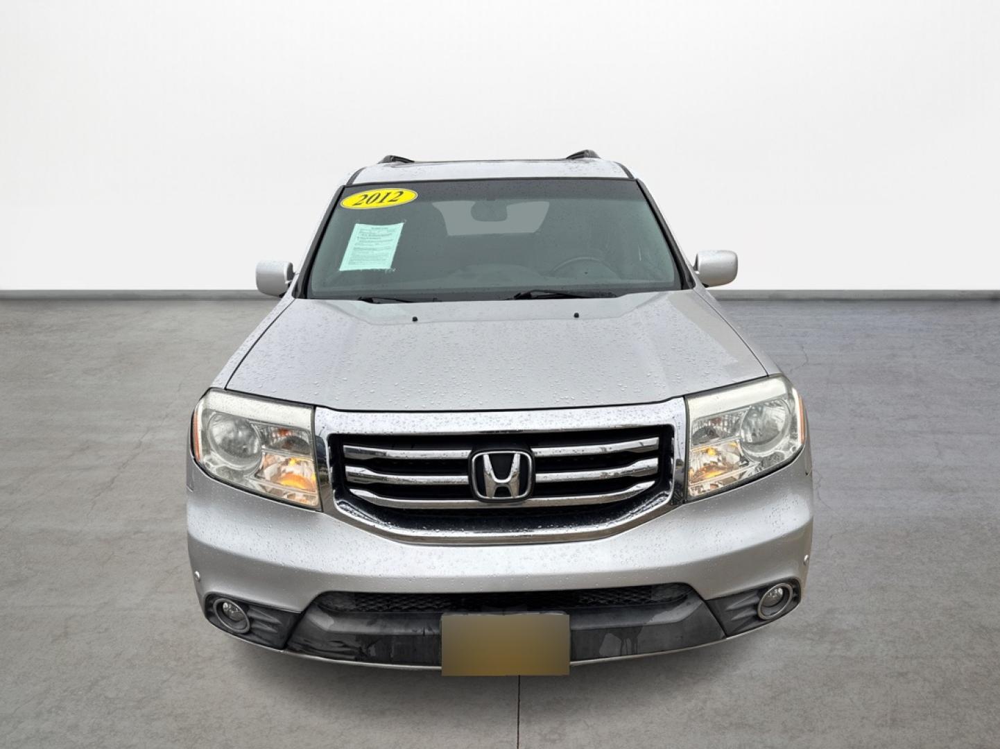 2012 Honda Pilot Touring 2WD 5-Spd AT with DVD (5FNYF3H90CB) with an 3.5L V6 SOHC 24V engine, 5-Speed Automatic transmission, located at 16710 Clay Rd., Houston, TX, 77084, (281) 859-7900, 0.000000, 0.000000 - Photo#1