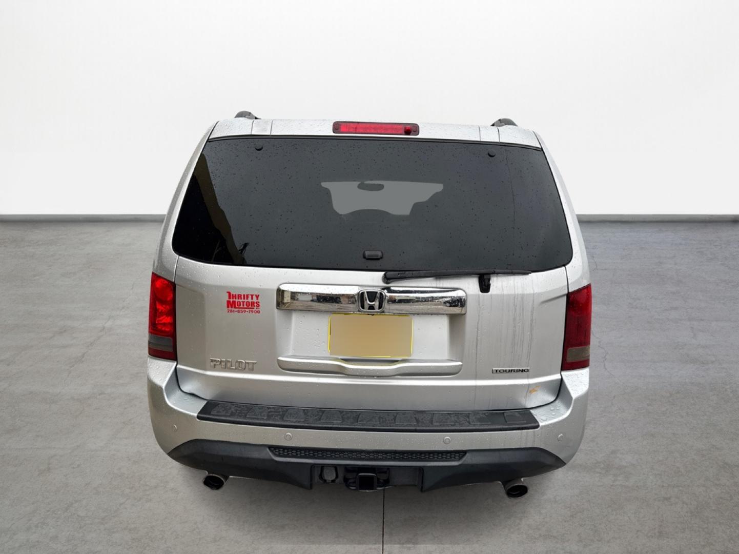 2012 Honda Pilot Touring 2WD 5-Spd AT with DVD (5FNYF3H90CB) with an 3.5L V6 SOHC 24V engine, 5-Speed Automatic transmission, located at 16710 Clay Rd., Houston, TX, 77084, (281) 859-7900, 0.000000, 0.000000 - Photo#5