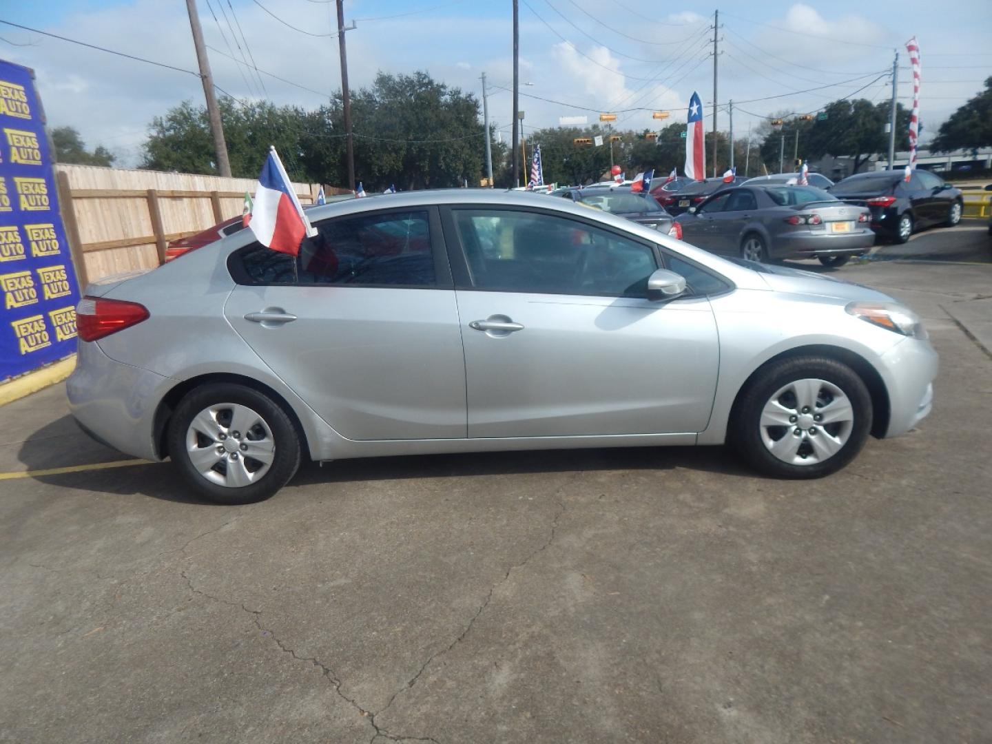 2014 SILVER KIA FORTE LX M6 (KNAFK4A61E5) with an 1.8L L4 DOHC 16V engine, 6-SPEED MANUAL transmission, located at 16710 Clay Rd., Houston, TX, 77084, (281) 859-7900, 0.000000, 0.000000 - Low Donw. Low Payments. - Photo#4